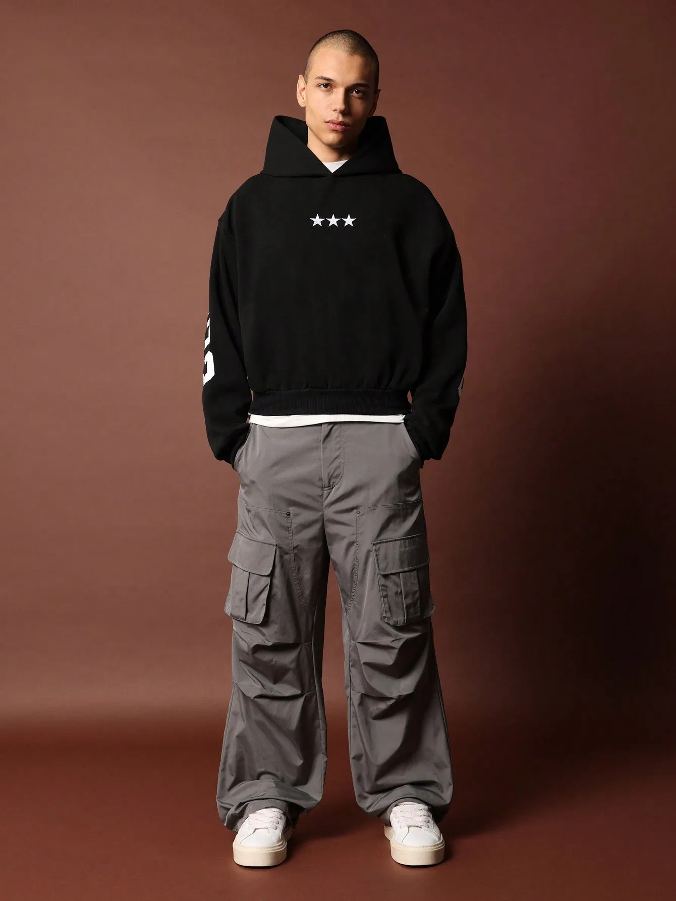 Crop Fit Overhead Hoodie With Front And Sleeve Graphic Print