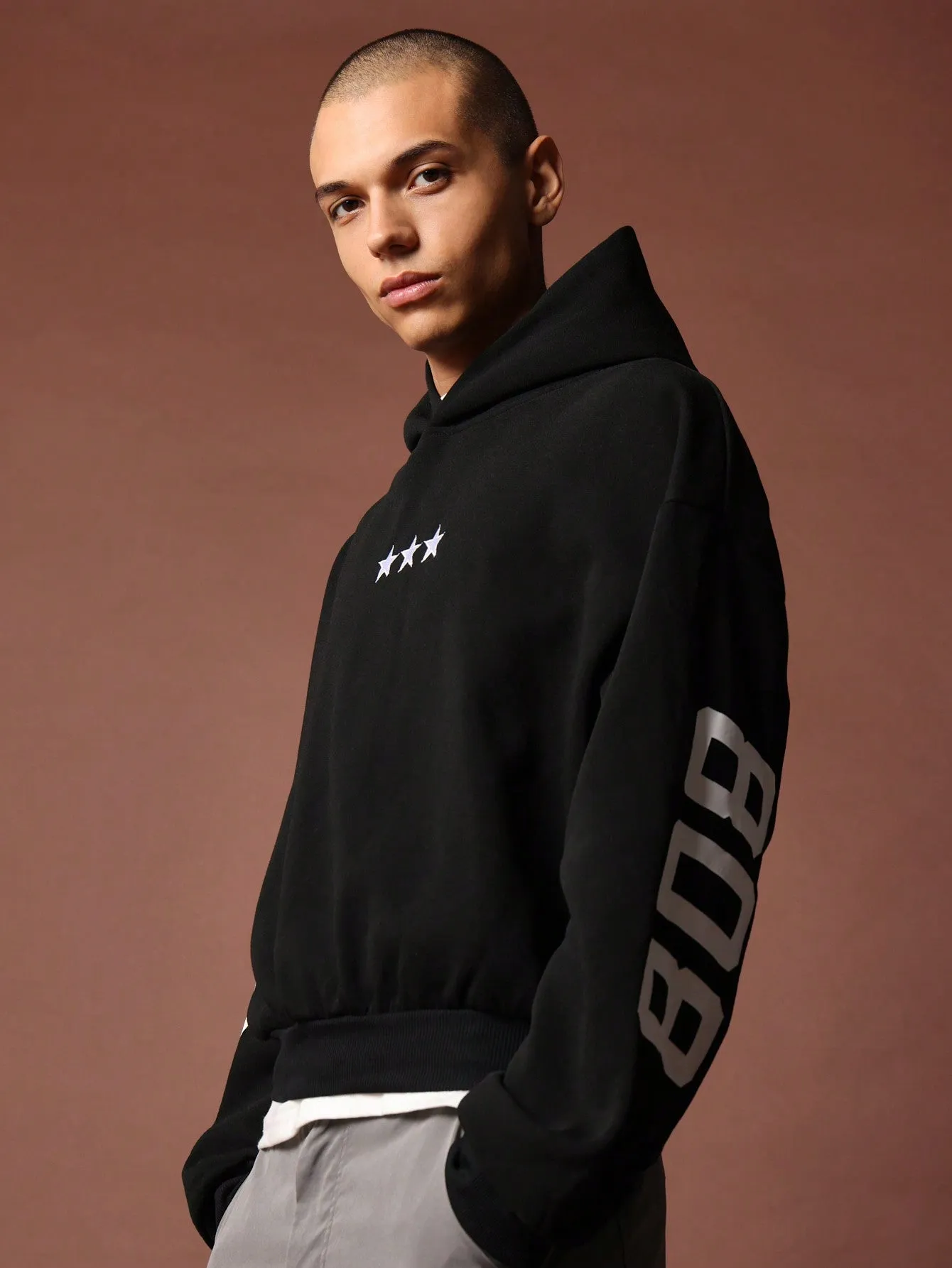 Crop Fit Overhead Hoodie With Front And Sleeve Graphic Print