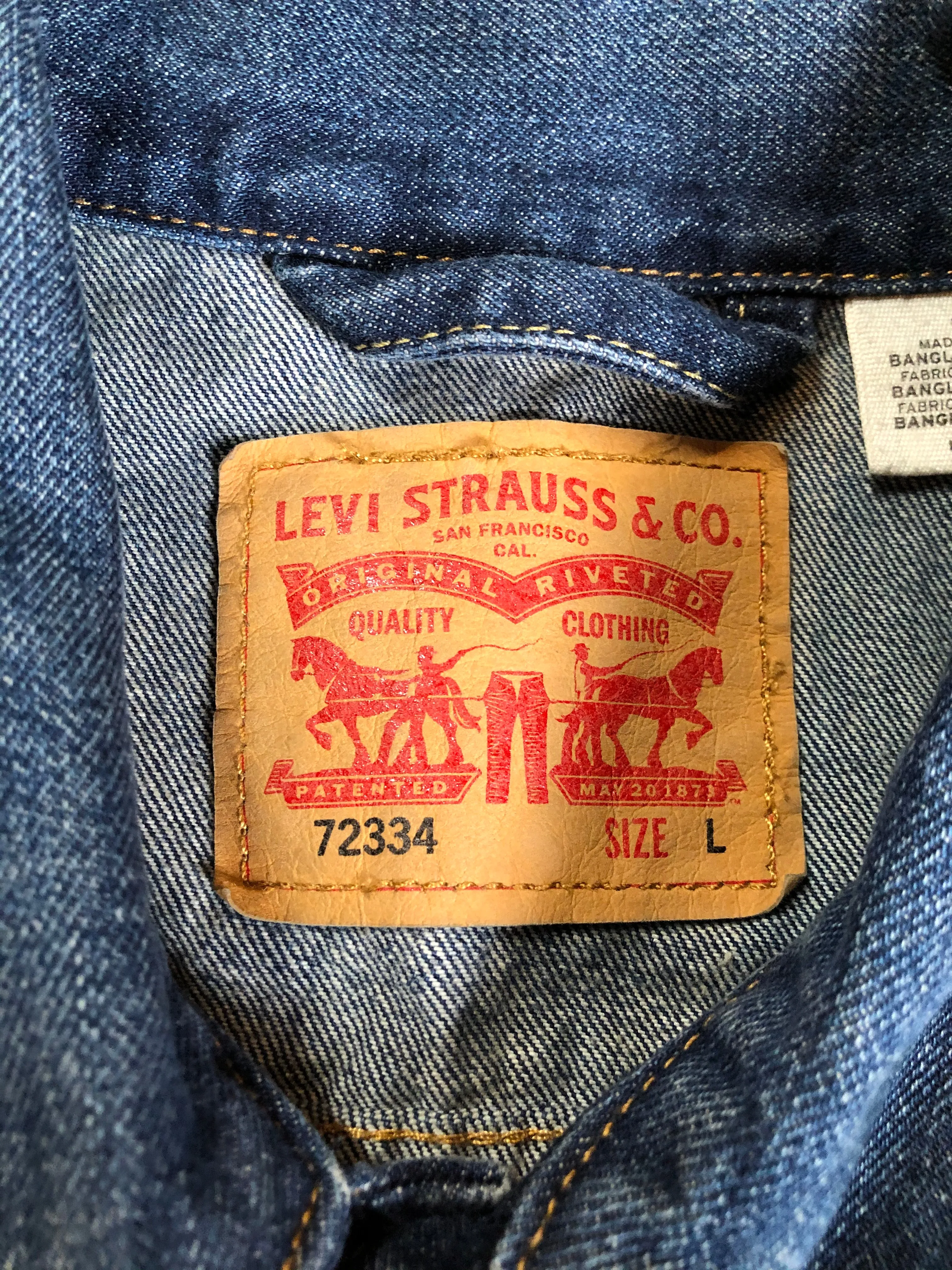 Levi’s Medium Wash Denim Trucker Jacket with Canada Patch