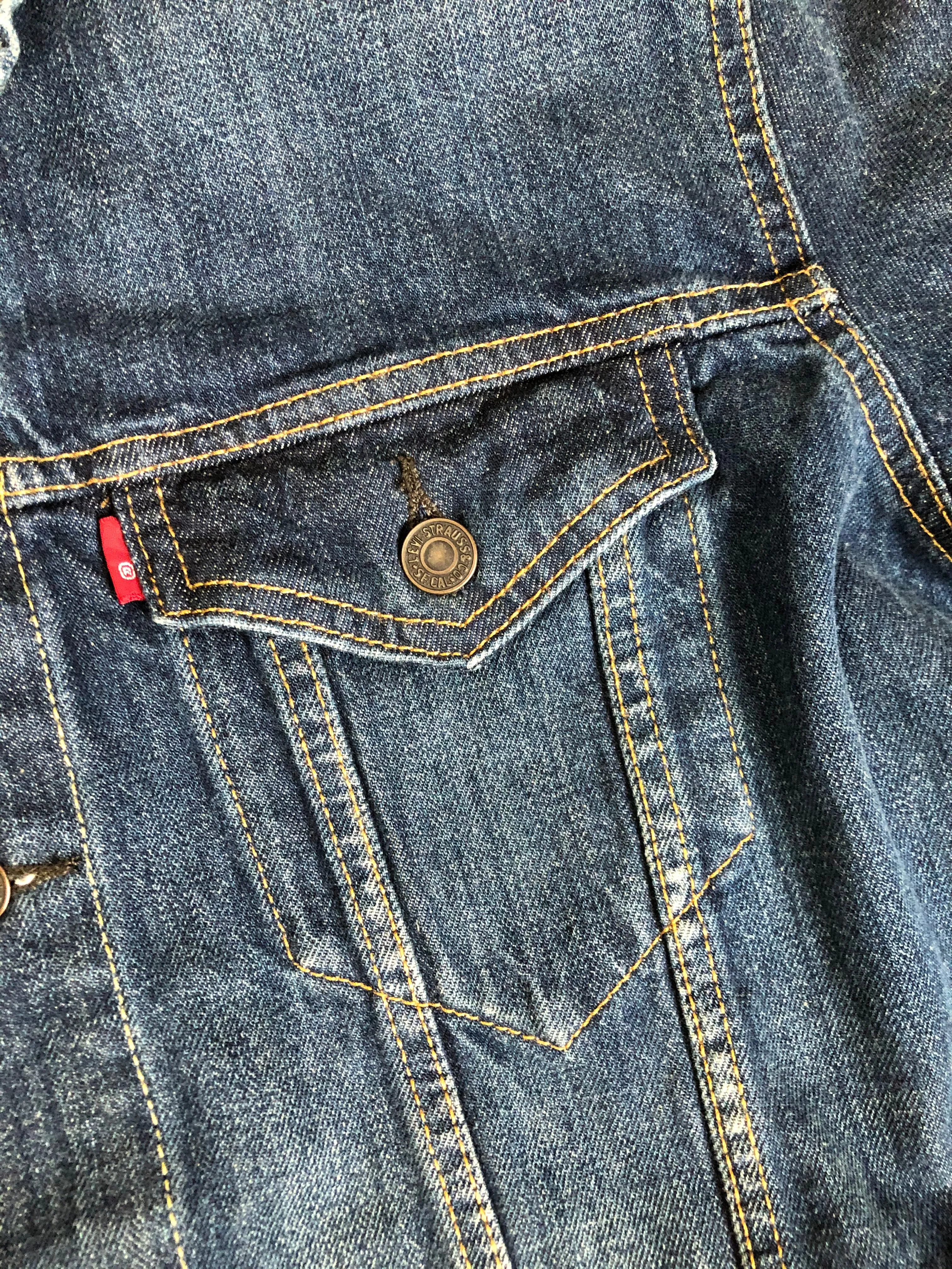 Levi’s Medium Wash Denim Trucker Jacket with Canada Patch